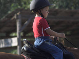 Even younger kids can give horse riding a go!