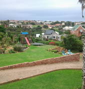 spacious gardens with jungle gym
