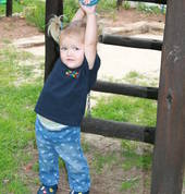 Working on the shoulder muscles in a fun filled outside area.