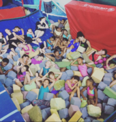 Some of our gymnasts having a doze in the pit - it's so spongy and soft!