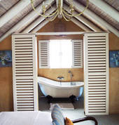 Top Honeymoon Cottage on second floor with open views