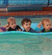 Toddlers ready to have parents out the pool