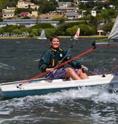 Young sailor having fun on the water after having completed a learn to sail course at Imperial Yacht Club