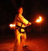 KSN Peter doing teh Flaming Bong(long stick)