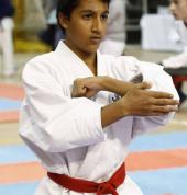 Senior Karateka taking part in Competition