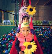 Some of our kiddies in our indoor play area, supporting sunflower day