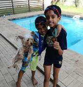 Dylan and Owen with their medals from the Learn to swim gala.